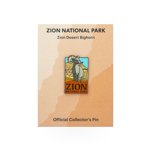 Eagle River Designs Checkerboard Bighorn pin featuring a black and white checkered sheep design on a metal backing.