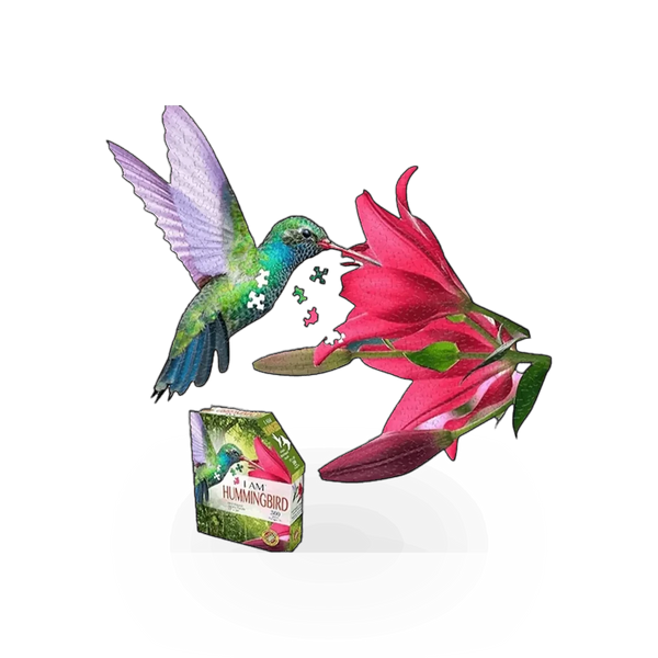 300-piece I Am Hummingbird puzzle by Madd Capp Games, featuring colorful hummingbird illustration on a flat surface.