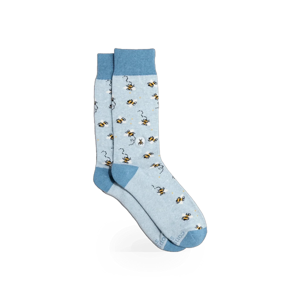 Beige Conscious Step bee-themed socks with black and yellow bee patterns, made from soft, comfortable fabric.
