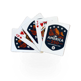 Impact Photographics America 250 playing cards, vibrant deck featuring patriotic design, laid out on a wooden surface.