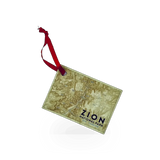 Wood map postcard ornament by Smith Western featuring a detailed map design on a rustic wooden surface.