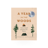 A hardcover book titled "A Year In The Woods" published by Ingram, featuring an illustrated woodland scene on the cover.