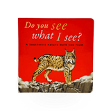Open book titled "Do You See What I See?" by Western National Parks Assoc showing colorful park illustrations.