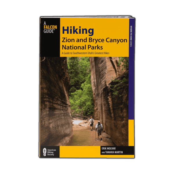 Simon & Schuster Falcon Hiking Zion & Bryce book cover showing scenic landscape and hiking trails in Zion and Bryce Canyon.