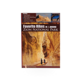 Book titled "Favorite Hikes Around Zion National Park" by Sharp End Publishing, featuring scenic hiking trail descriptions.