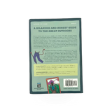 Open book titled "How To Suffer Outside" by Mountaineers Books, showing pages with outdoor adventure tips.