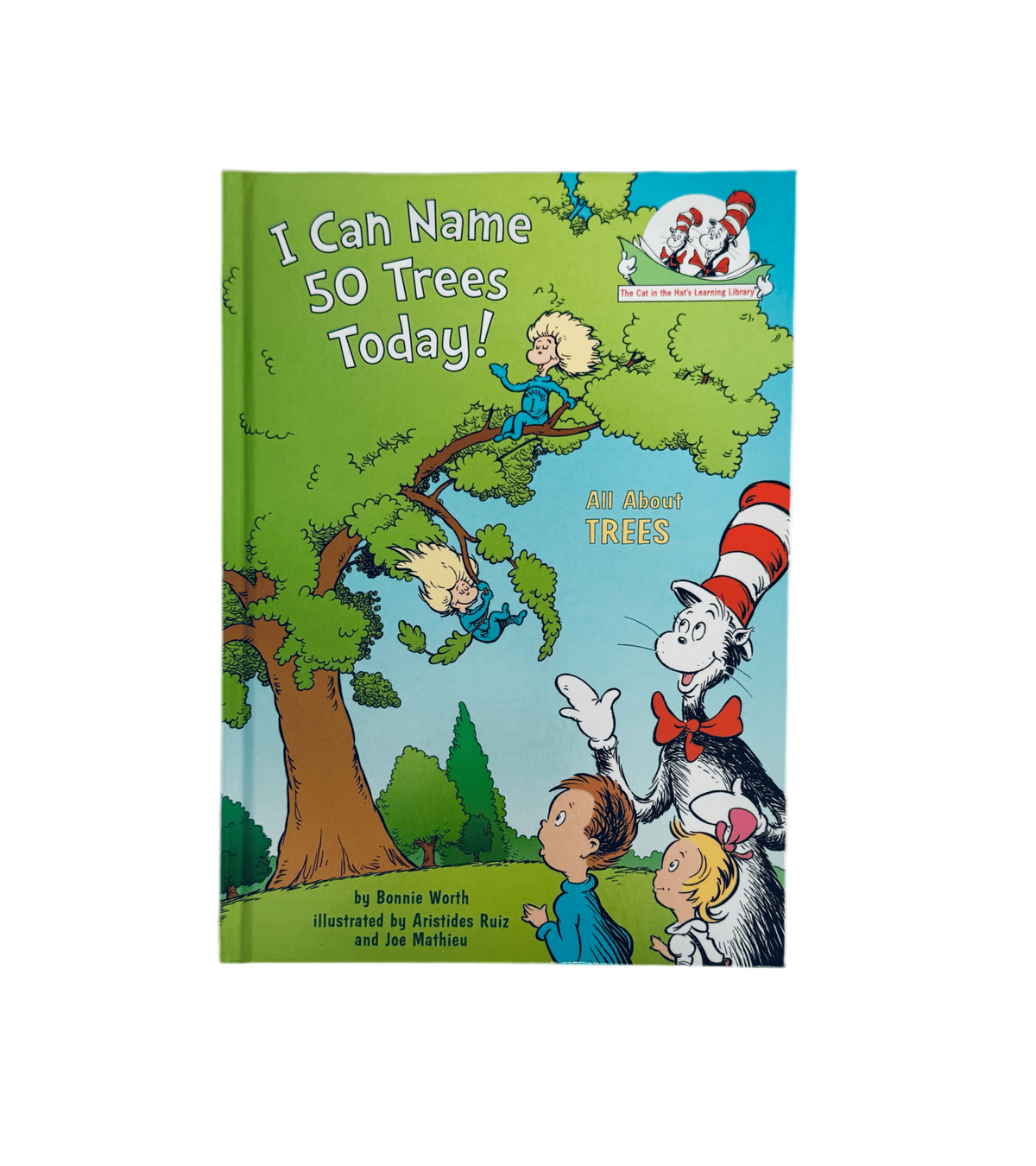 Open book titled "I Can Name 50 Trees Today" by Penguin Random House, showing colorful illustrations of various tree species.