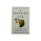 The Nature Fix book by W.W. Norton showing a paperback cover with nature-themed artwork and title text.
