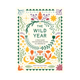 Open copy of "The Wild Year" book published by Penguin Random House, showing colorful cover with nature-inspired artwork.