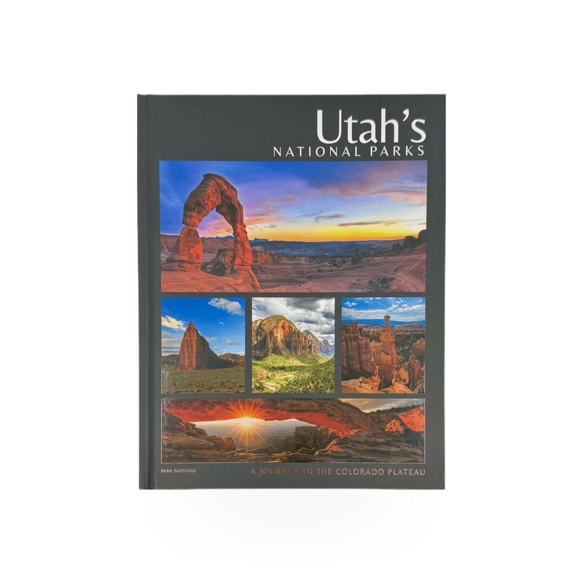 Open book titled Utah's Natl Parks Journey by Park Partners, featuring scenic images of Utah's national parks on the pages.