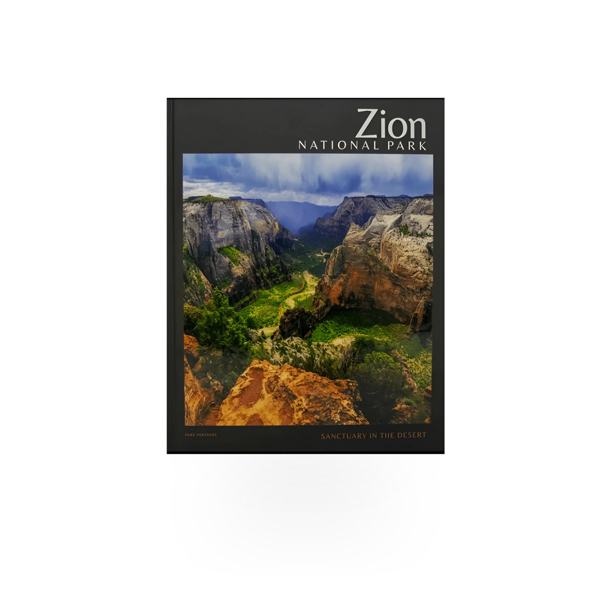A book titled "Zion Sanctuary in the Desert" by Park Partners, featuring desert landscape imagery on the cover.