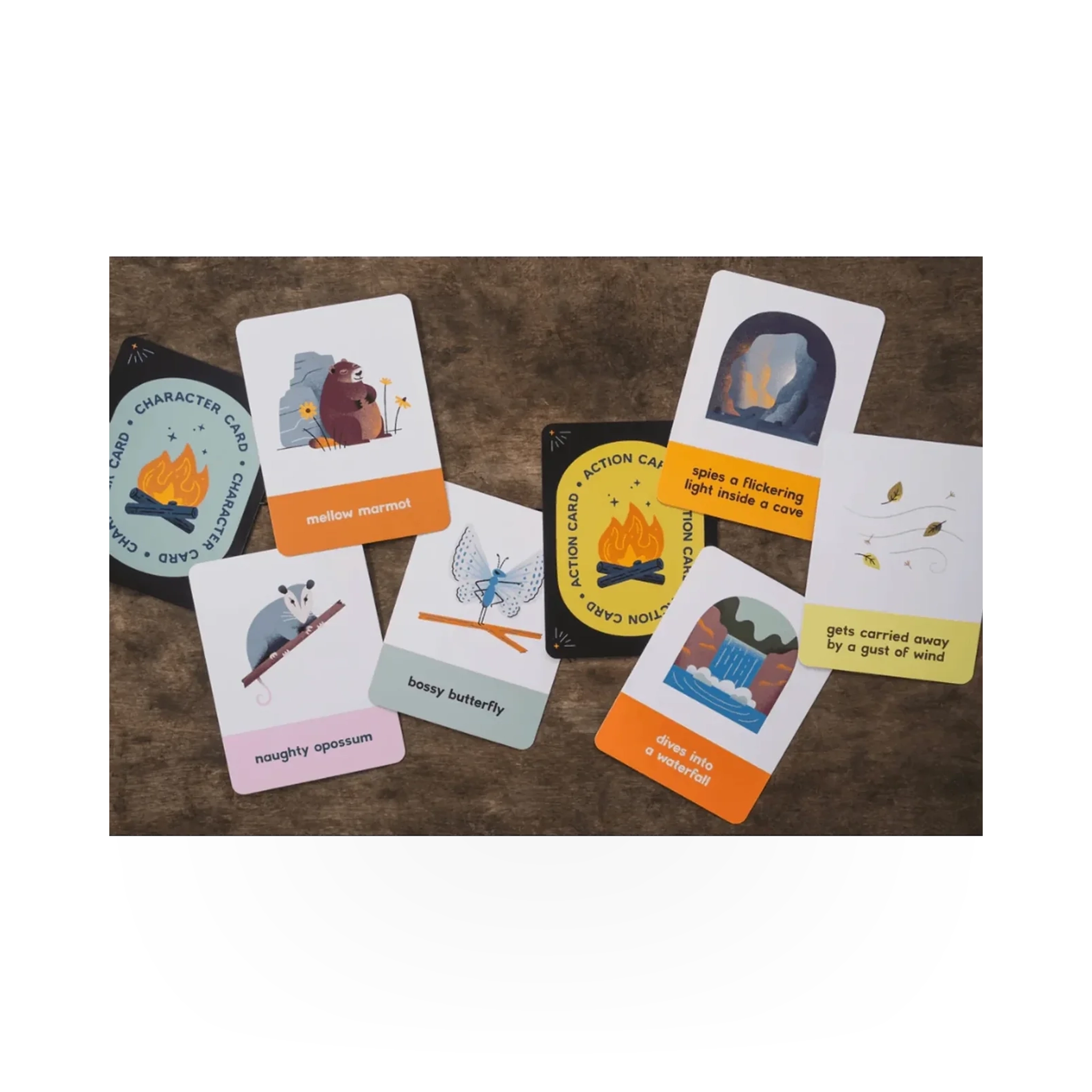 Colorful children's storytelling deck titled "Campfire Stories" by Mountaineers Books, featuring illustrated cards for kids' campfire fun.