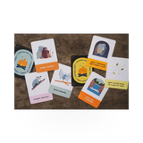 Colorful children's storytelling deck titled "Campfire Stories" by Mountaineers Books, featuring illustrated cards for kids' campfire fun.