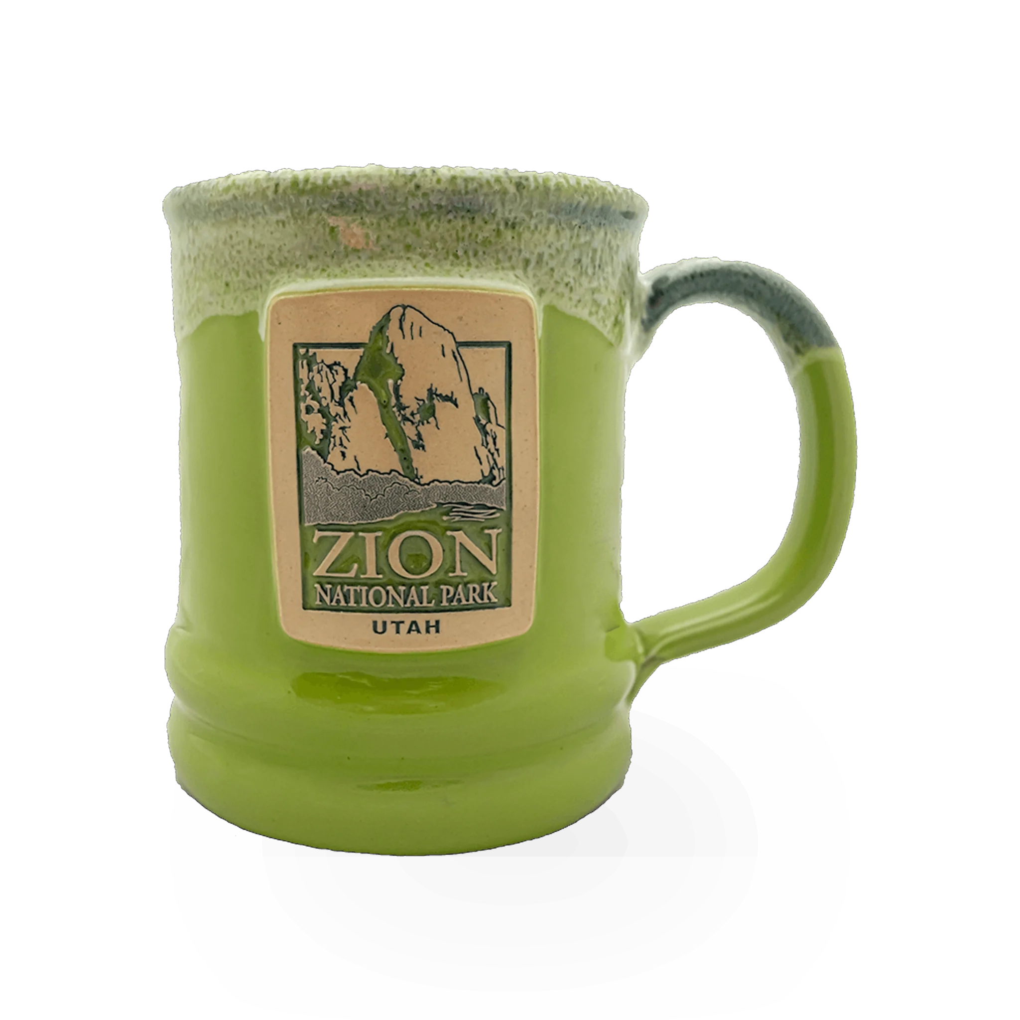 Deneen Pottery Deneen GWT Kiwi themed mug with green kiwi design on white ceramic surface