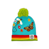 Pollinator Beanie hat by Haywood Studios Inc., featuring a colorful floral and bee design on a cozy knit hat.