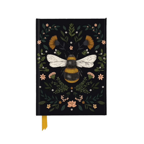 Foiled bee pollinator journal by Simon & Schuster, featuring a decorative cover with bee and pollinator design.