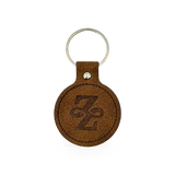 Leather keychain with ZFP logo by Impact Photographics, featuring a sleek design and metal keyring attachment.