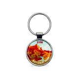 Eagle River Designs Zion National Park merit badge keychain with colorful design and park emblem.