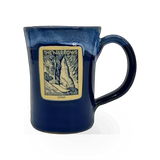 Deneen Pottery navy mug with narrow-style design, featuring a smooth ceramic finish and a classic shape for everyday use.