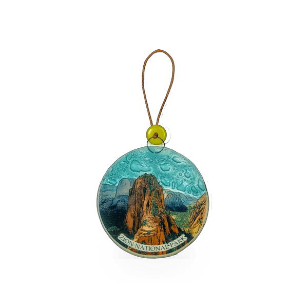 Glass angel ornament from Pampeana featuring a detailed angel design, perfect for holiday or decorative displays.