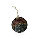 Wild Tribute Into The Wild ornament featuring a nature-inspired design, perfect for decorating or collecting.
