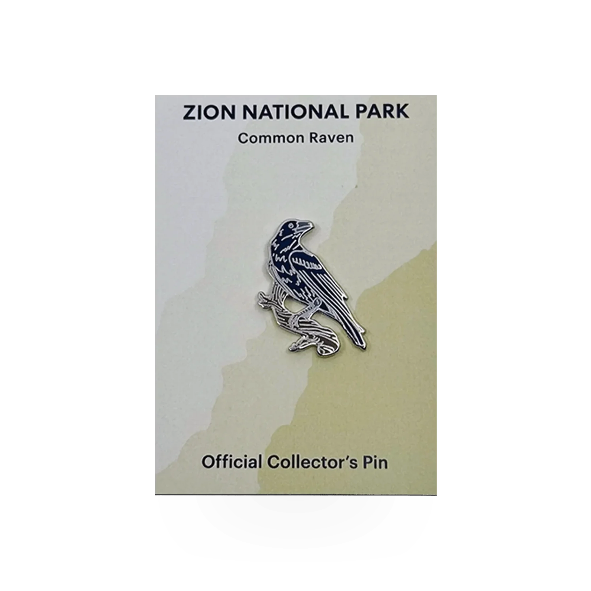 Eagle River Designs animal theme pin featuring a detailed common raven illustration on a metal pin.