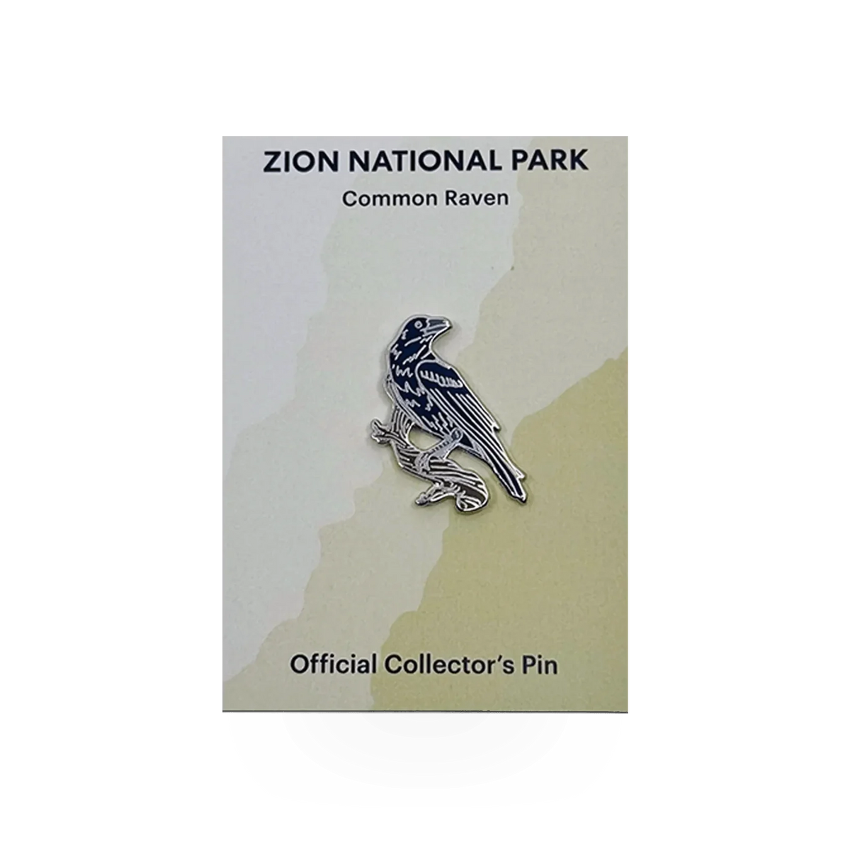 Eagle River Designs animal theme pin featuring a detailed common raven illustration on a metal pin.