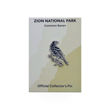 Eagle River Designs animal theme pin featuring a detailed common raven illustration on a metal pin.
