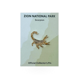 Eagle River Designs animal theme pin featuring a detailed scorpion design on a metallic pin backing.