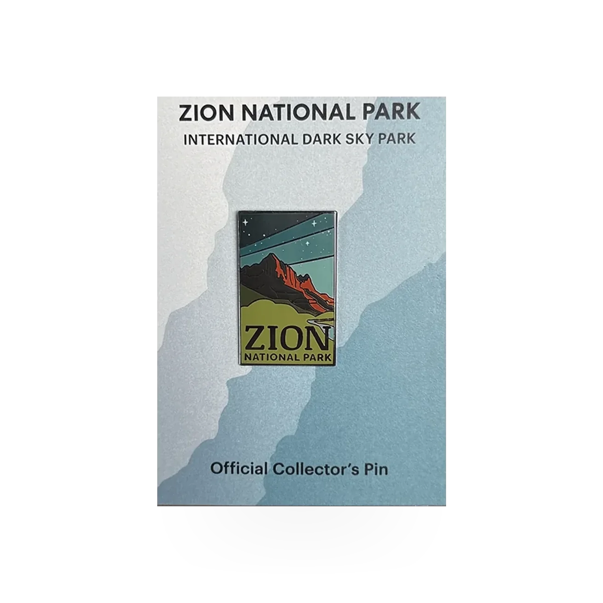 Eagle River Designs Zion National Park Dark Sky theme pin featuring a night sky scene and park landscape.
