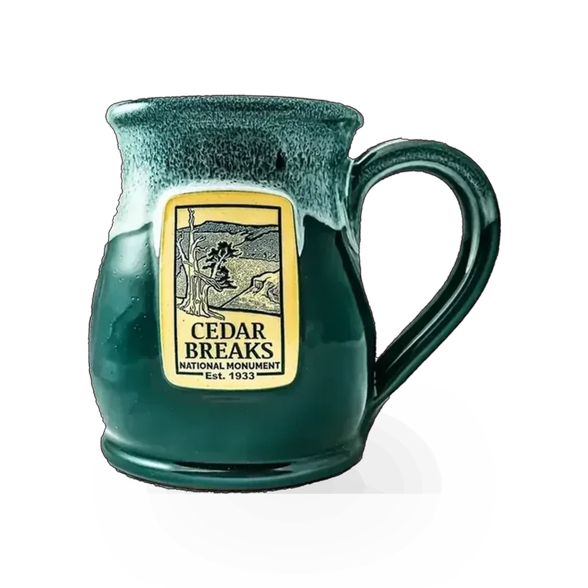 Deneen Pottery Cedar Breaks theme mug featuring a scenic landscape design with earthy tones and detailed illustrations.