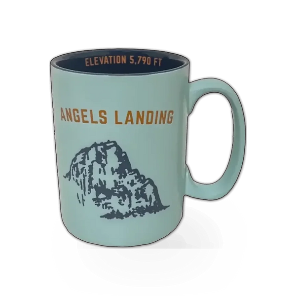 Smith Western etched Angels Landing mug featuring detailed mountain and angel designs on ceramic surface.