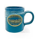 Deneen Pottery Deneen Kolob themed mug with intricate design, ceramic body, and Deneen Pottery branding visible on the mug.