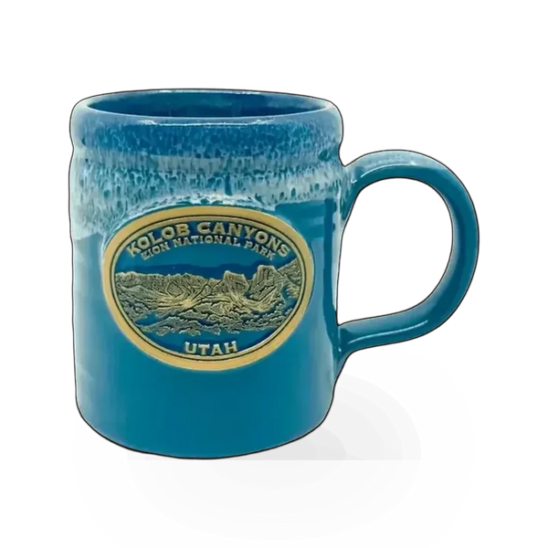 Deneen Pottery Deneen Kolob theme mug with intricate design, ceramic construction, and a glossy finish on a neutral background.
