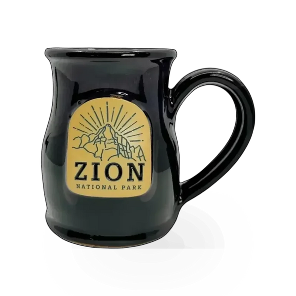 Deneen Pottery Zion Sunburst themed mug with vibrant sunburst design and earthy tones, ceramic coffee mug on white background