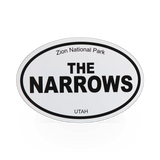 Black and white oval sticker with narrows design from Impact Photographics, featuring a sleek, minimalist look.