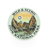 Green "Wild & Scenic" sticker by American Backcountry featuring vibrant nature-inspired artwork.