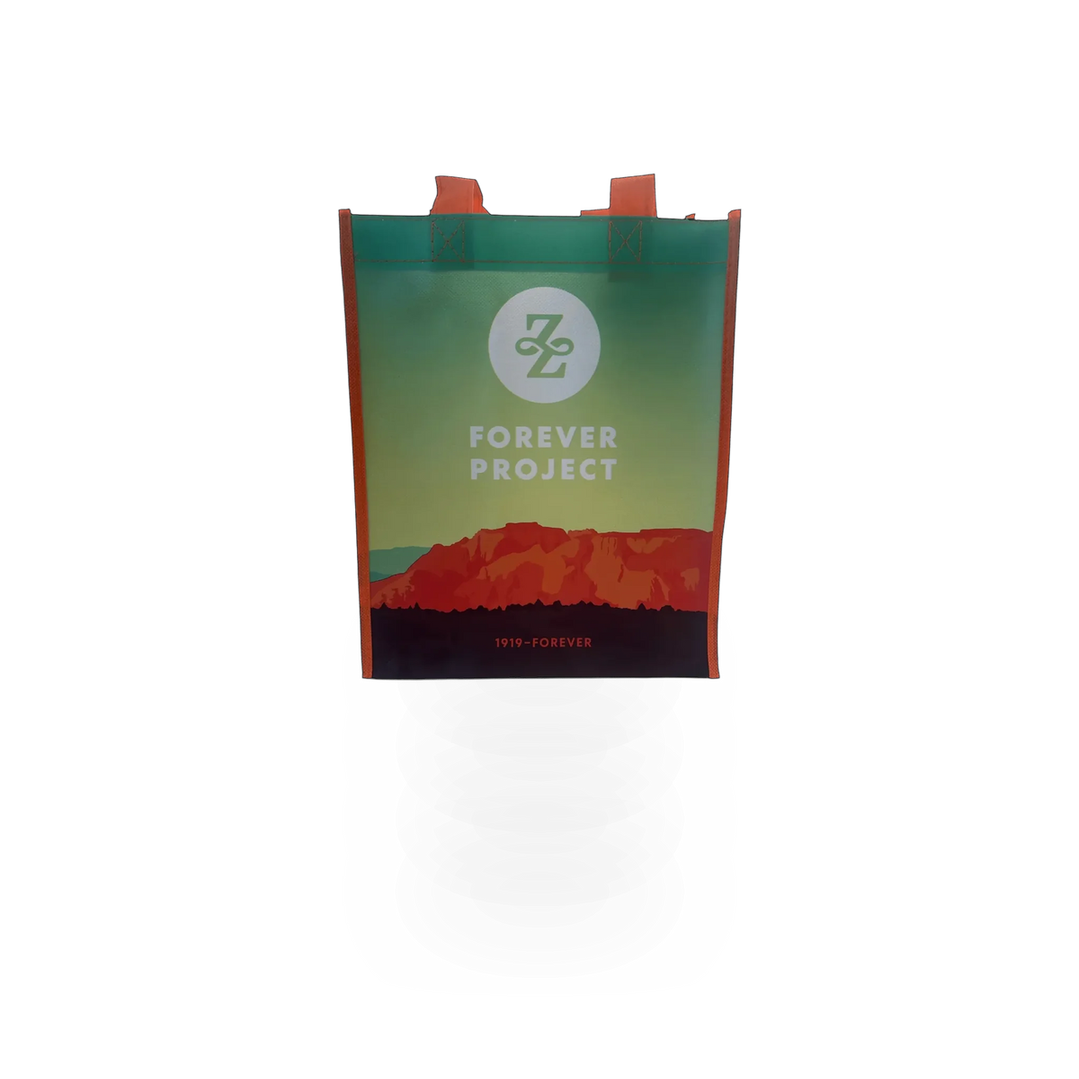 Large Impact Photographics tote merchandise bag with sturdy handles and spacious interior for carrying items.