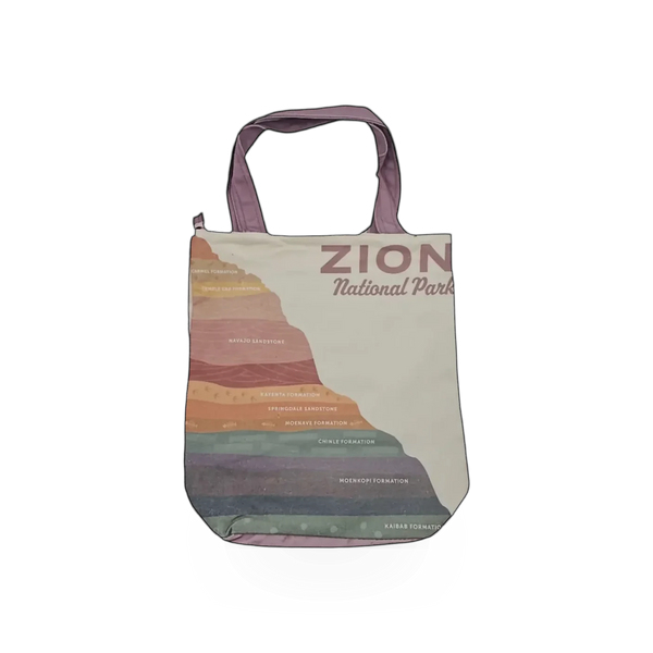 Impact Photographics tote bag featuring a rock layers theme with a colorful design, ideal for casual carrying.
