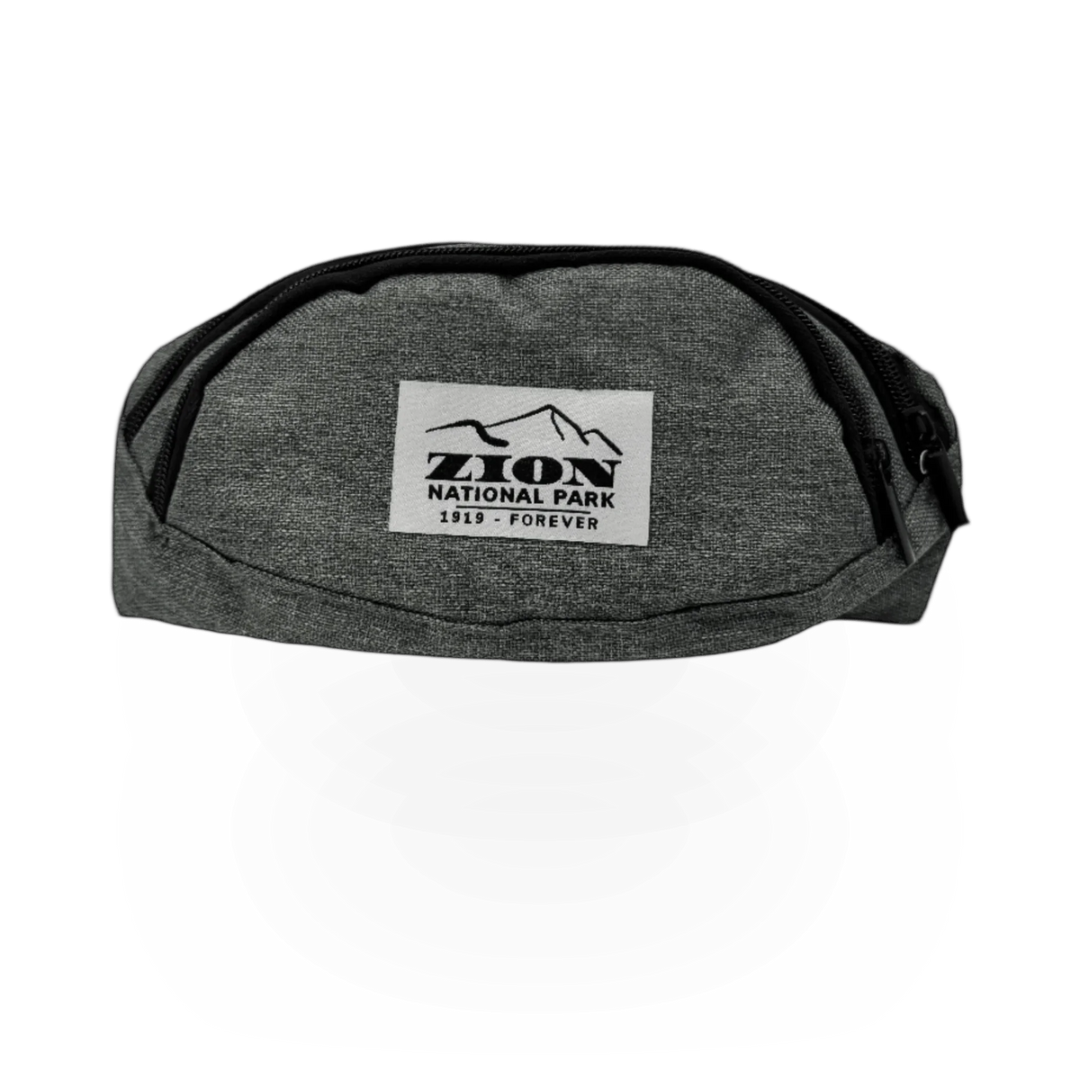 Impact Photographics waist pack in assorted Zion colors, featuring multiple compartments and adjustable strap for outdoor activities.